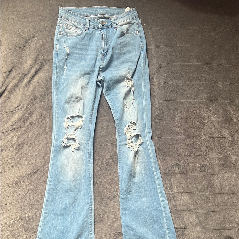 Trendy Distressed Light Blue Flare Jeans